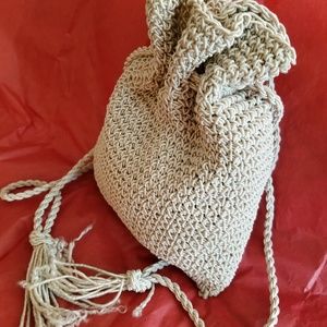 Beige drawstring  evening bag